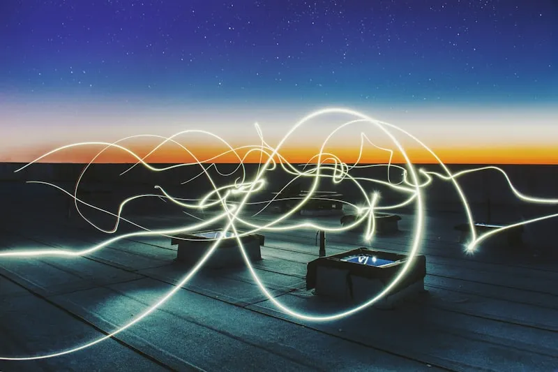 Light trails on a rooftop at night