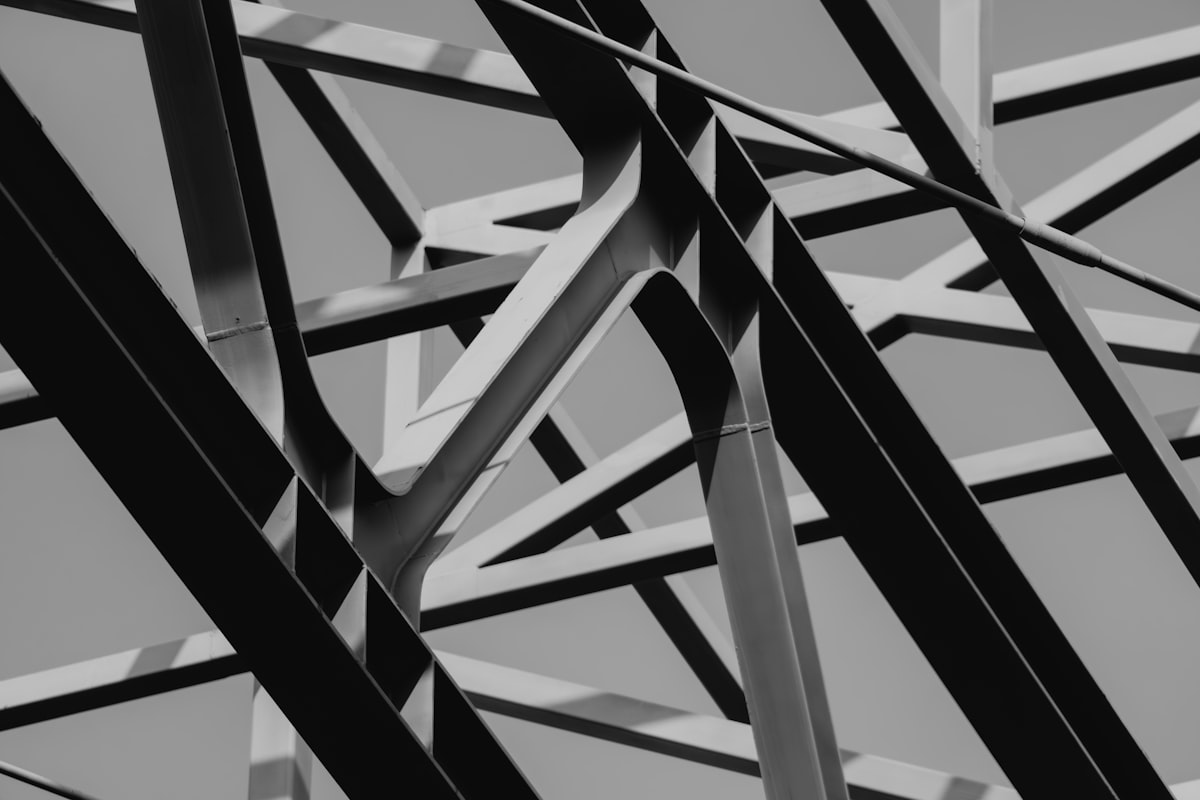 Abstract geometric pattern of intersecting metal beams