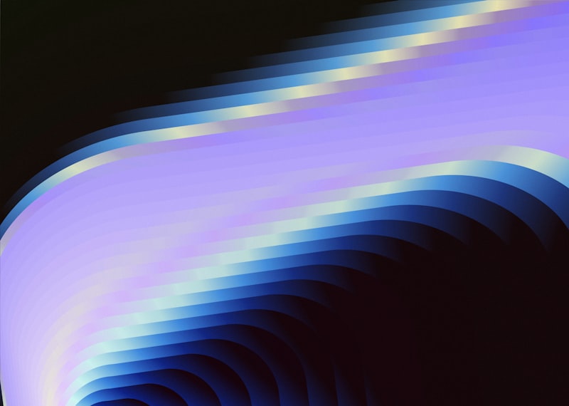 Abstract blue and purple wavy lines on a dark background